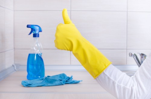 Mayfair cleaners performing deep cleaning in kitchen